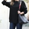 42POPS | Black Round Neck Long-Sleeve Hi-Low Sweater - Women